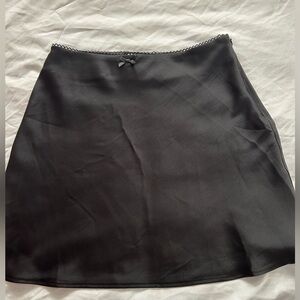 HYFVE Black Mini Slip Skirt with Bow Detail